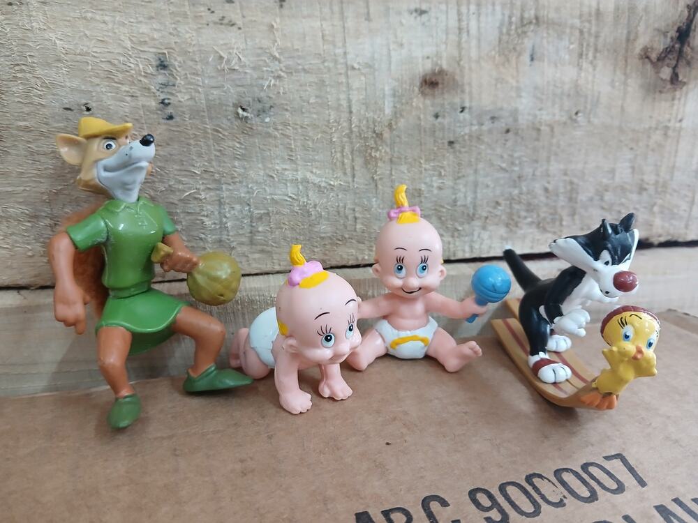 Vintage collectible figurines Robin Hood, Baby Herman, Sylvester and Tweety.
